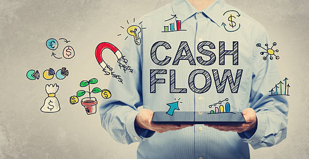 Cash Flow concept with young man holding a tablet computer
